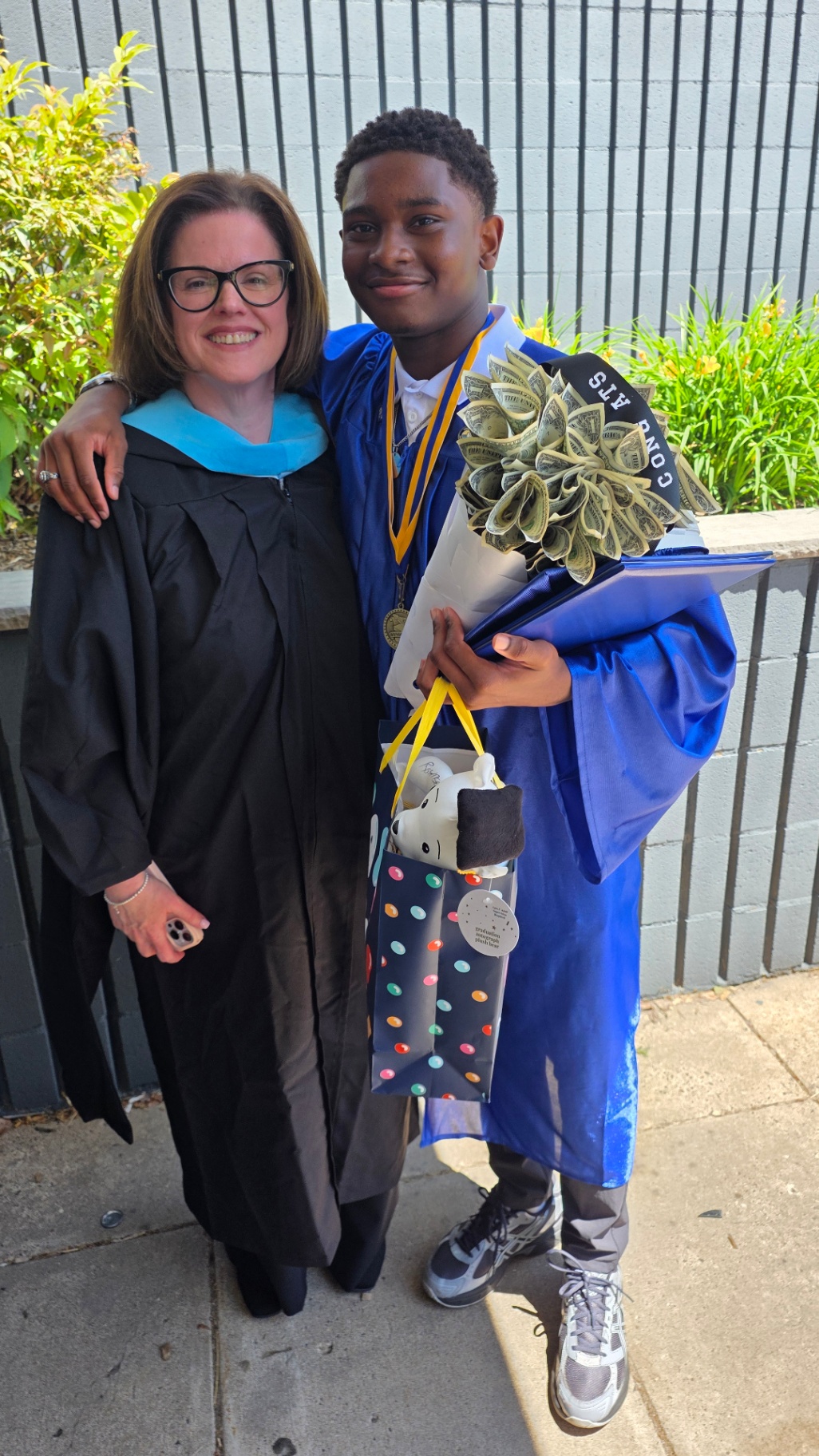 Zadon with teacher and money bouquet