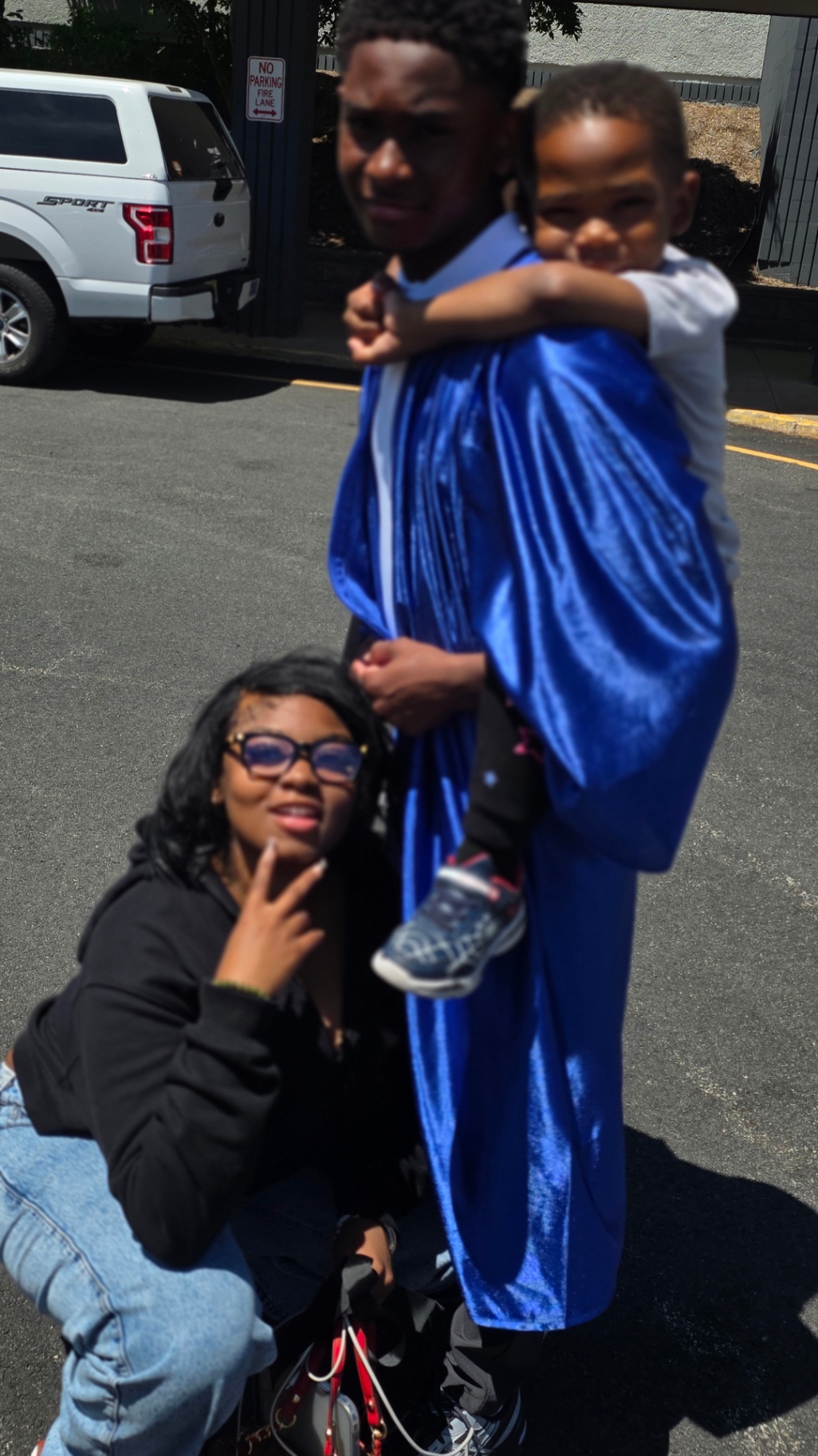 Zadon with family in parking lot