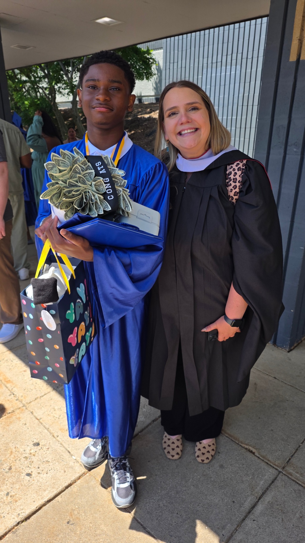 Zadon with staff member after ceremony