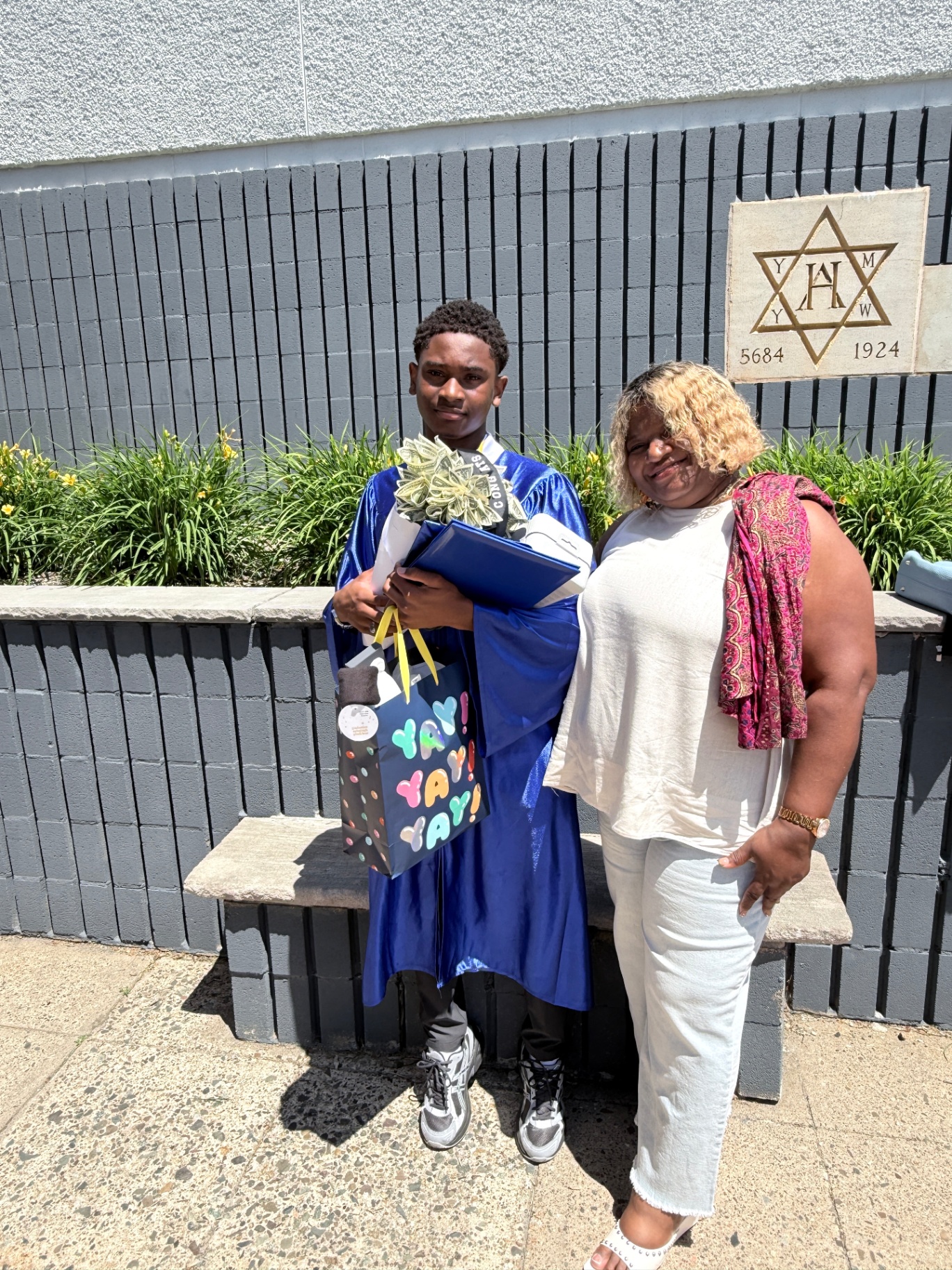 Zadon with mom by the John P. Holland sign