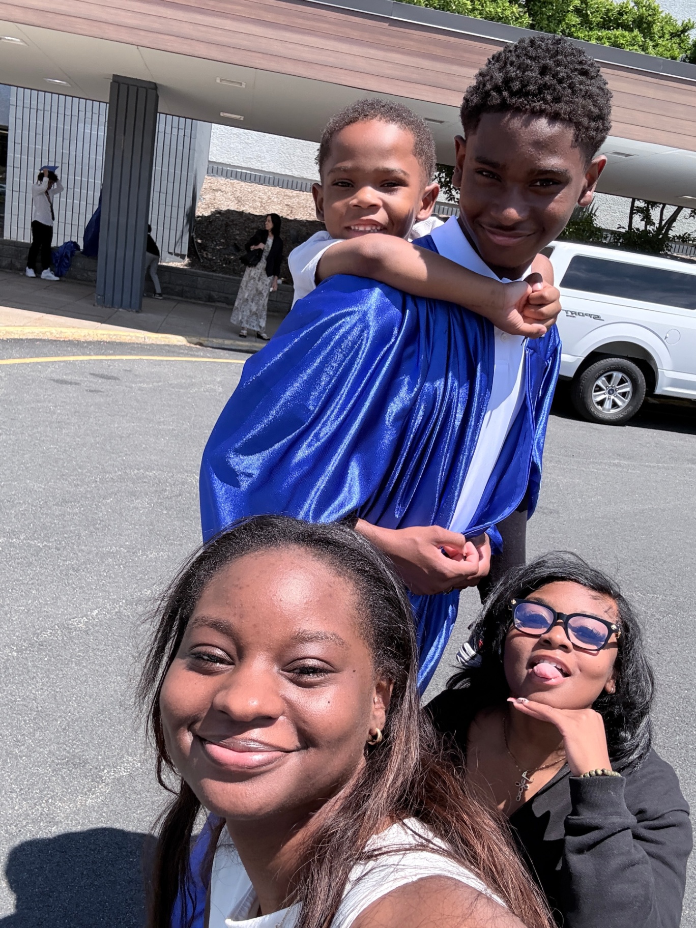 Family selfie — Zadon, siblings, and his cape
